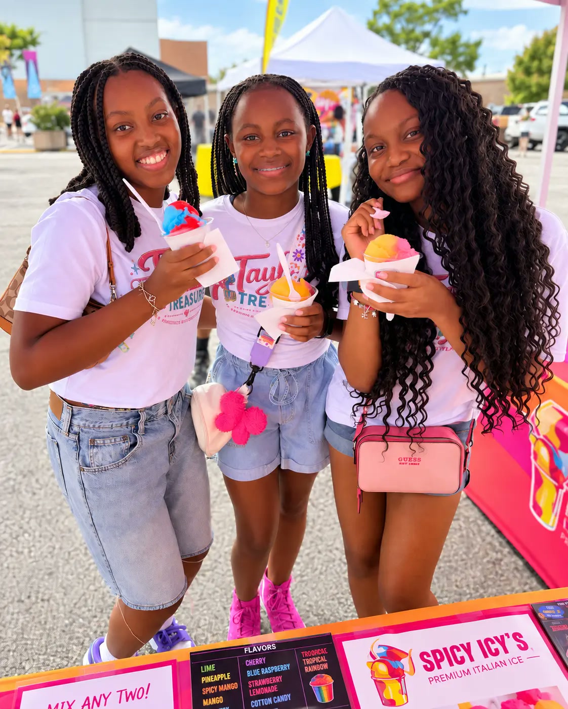 Customers with Spicy Icy's at an event